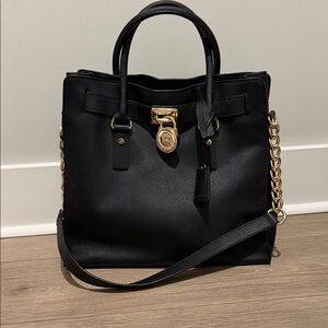 Black Leather Michael Kora Handbag with Gold Accents